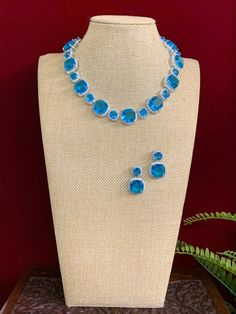 American diamond necklace . Premium crystal work . Comes with matching earring. Crystal Work, American Diamond Necklaces, American Diamond, Necklace Choker, Diamond Stone, Matching Earrings, Stone Necklace, Aqua Blue, Penny