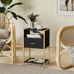 a living room with wicker chairs and a side table on the floor next to a plant