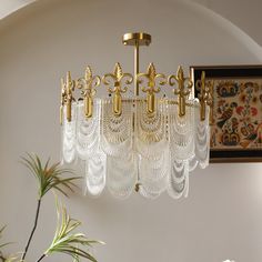 a chandelier hanging from the ceiling in a room