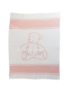 a pink and white towel with a teddy bear drawn on the front in red ink