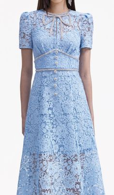 A calming vision in blue lace, this dress puts its rich floral textures on show with a universally flattering silhouette. Echo its diamanté bow with sparkling accessories at your next soirée. Main Fabric: 98% Polyester 2% Polyamide Lining: 100% PolyesterFitted style, take one size up if between sizesThis style has mini Feminine Formal Dresses With Scalloped Lace, Feminine Formal Lace Mini Dress, Feminine Formal Mini Lace Dress, Formal Feminine Mini Lace Dress, Delicate Lace Midi Dress For Formal Occasions, Elegant Mini Lace Dress With Lace Trim, Knee-length Evening Dress With Lace Collar, Elegant Midi Dress With Lace Collar For Wedding, Elegant Mini Dress With Lace Collar For Formal Events