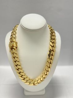 Indulge in the timeless elegance of our Cuban link chains and bracelets, meticulously handcrafted to perfection. Each piece is a solid statement of craftsmanship, created with passion and precision. Our Cuban link collection is plated not once, not twice, but five times with a lavish 14K Gold polish, ensuring a radiant and opulent finish that exudes sophistication. Embrace the uniqueness of handmade jewelry, where each link is carefully assembled to create a one-of-a-kind masterpiece. Our commitment to craftsmanship ensures that every detail is thoughtfully considered, providing you with a timeless accessory that stands the test of time. Please note that the artisanal nature of our creations means that some pieces may take up to 4 weeks to be crafted with the utmost care. Additionally, as Luxury White Gold Cuban Link Necklaces, Luxury White Gold Cuban Link Chain Necklace, Luxury Silver Cuban Link Jewelry, Luxury Cuban Link Jewelry With Pave Setting, Luxury White Cuban Link Necklace With Curb Chain, Luxury Cuban Link Necklace In Cubic Zirconia, Luxury White Gold Cuban Link Jewelry, Luxury Cuban Link Jewelry Bracelet, Luxury Cuban Link Jewelry For Formal Occasions