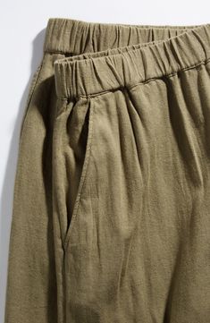 Cut from a breezy linen blend with a high waist and wide legs, these pull-on pants are a cool remake of a closet classic. 30" regular inseam; 25" leg opening; 11 12" front rise; 16" back rise (size Medium) 28" petite inseam; 24" leg opening; 11" front rise; 15" back rise (size Medium P) Elastic waist Front slant pockets; faux back welt pocket 55% linen, 45% rayon Machine wash, tumble dry Imported Women's Clothing Spring Beige Wide Leg Pants With Pull-on Style, Spring Cotton Bottoms In Flax Color, Cotton Wide Leg Pull-on Pants, Solid Cotton Wide Leg Pull-on Pants, Spring Linen Pull-on Bottoms, Baggy Flax Bottoms For Spring, Baggy Khaki Wide Leg Pants With Elastic Waistband, High Waist Pull-on Wide Leg Pants For Summer, Khaki Linen Bottoms With Pockets