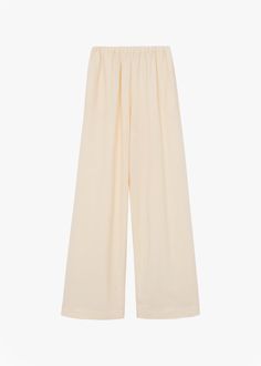 Color: Cream Lightweight fluid fabric Relaxed fit Low rise Straight leg Elasticated waist Side seam pockets Slip on style Unlined 100% Rayon Dry Clean By The Frankie Shop. Imported Paris Store, Cream Pants, Denim Suit, The Frankie Shop, Frankie Shop, Paris Woman, Leather Texture, Swimwear Accessories, Jumpsuit Dress