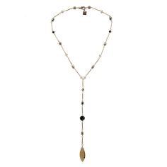 This versatile necklace features an authentic vintage Conta Di Ojo bead from Cape Verde, known for its protective properties and believed to attract good luck and positive energy. Accentuated with Austrian crystals and real pearls, the design adds sophistication and sparkle. Handmade in the U.S. with precision, the necklace is finished with a silver-plated chain for timeless elegance. Perfect for adding cultural significance and style to any outfit, this necklace blends tradition with modern all Elegant Single Strand Long Drop Necklace, Elegant Long Drop Single Strand Necklace, Elegant Beaded Chain Lariat Crystal Necklace, Elegant Lariat Crystal Necklace With Beaded Chain, Elegant Adjustable Pearl Necklace With Gemstone Beads, Elegant Crystal Lariat Necklace With Beaded Chain, Elegant Adjustable Beaded Chain Necklace, Elegant Adjustable Pendant Beaded Necklace, White Beaded Chain Lariat Necklace