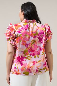 Show off your effortlessly sweet style in the Abigal Floral Brenna Mock Neck Ruffle Blouse! Our favorite blouse takes shape featuring a smocked, mock neck. Ruffle layered short sleeves steal the show while framing a relaxed bodice that can be styled tucked into your favorite high waisted bottoms.- Mock neck- Ruffle layer sleeves- Keyhole- Classic fit- Color: Coral MultiSize + Fit - Model is 5'10" and wearing size 2X- Measurements taken from size 2X - Chest: 49 1/2"- Length: 26 1/2" Fabric Self: Feminine Smocked Top With Gathered Neckline For Spring, Feminine Smocked Top With Gathered Neckline, Spring Pink Blouse With Smocked Back, Pink Smocked Back Blouse For Spring, Pink Blouse With Smocked Back For Spring, Spring Smocked Top With Gathered Neckline And Short Sleeves, Spring Tops With Smocked Back And Flutter Sleeve, Flutter Sleeve Tops With Smocked Back For Spring, Spring Blouse With Smocked Back And Flutter Sleeve