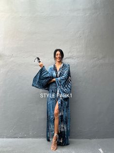 Bali Tie dyed Kimono long jacket,  It's made by the Bali's traditional hand Tie dyed  If you are very small this may be too big.  Matching bag and belt are included  Stylepark1 Model  -Her height is 175Cm/5.74ft weight is 57kg/126lb /American size, she wore  ~ M  size.  Made from soft Rayon   At first, you may smell the unique dye. It will disappear after you wash it. So do not worry. Color : Bali hand tie dyed -Niagara  Blue & multi  motif    One size fits all      Model wore / A  A - Length - Tie Dye Kimono, Hand Tie, Long Kimono, Diy Sewing Clothes, Long Jacket, Holiday Looks, Kimono Dress, Tall Women, Tie Dyed