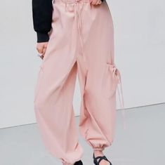 Size Medium. Color Is Soft Pink. Never Worn. 100% Polyester. #Pants #Cargopants #Summer Casual High Waist Pink Cargo Pants, Trendy Pink Cargo Pants For Summer, Trendy Pink Cargo Pants For Spring, Spring Pink Bottoms With Cargo Pockets, Summer Casual Cargo Pants, Casual Pink Bottoms With Pockets, Trendy High-waisted Cargo Pants For Spring, Casual Pink Parachute Pants For Spring, Casual Pink Bottoms With Cargo Pockets