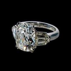 an oval and baguette cut diamond ring