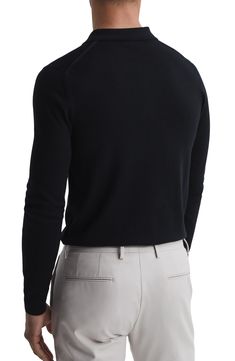 Fine-gauge wool provides luxe comfort in a trim polo knit with long sleeves that layers easily and looks splendid on its own. 26 1/2" length (size Medium) Point collar Long sleeves 100% wool Dry clean or hand wash, dry flat Imported Black Long Sleeve Cashmere Turtleneck, Black Cashmere Long Sleeve Turtleneck, Formal Merino Wool Sweater With Ribbed Cuffs, Formal Wool Sweater With Ribbed Cuffs, Long Sleeve Wool Tops For Business, Formal Cashmere Polo Sweater With Ribbed Collar, Formal Long Sleeve Polo Sweater For Winter, Elegant Long Sleeve Turtleneck With Ribbed Cuffs, Formal Long Sleeve Cashmere Polo Sweater