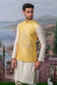 Yellow bundi with floral embroidery using zari, pearl, sequin. Paired with an inner kurta and pant. - Aza Fashions Festive Bandhgala With Gota Work In Straight Kurta Style, Festive Bandhgala With Chikankari Embroidery For Designer Wear, Festive Bandhgala With Gota Work, Festive Bandhgala With Gota Work For Eid, Chanderi Nehru Jacket For Designer Wear And Festive, Festive Designer Wear Chanderi Nehru Jacket, Festive Chanderi Nehru Jacket For Designer Wear, Bollywood Style Designer Chanderi Nehru Jacket, Chanderi Bandhgala With Gota Work For Diwali