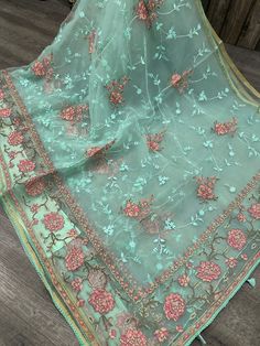 Lightweight and sheer Dhakai Muslin  saree with floral embroidery.  Blouse fabric included. Muslin Jamdani Saree, Floral Embroidery Blouse, Muslin Saree, Dhakai Jamdani Saree, Jamdani Saree, Embroidery Blouse, Blouse Fabric, Sea Green, Floral Embroidery