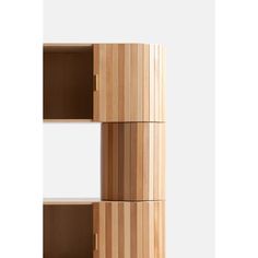 three wooden shelves stacked on top of each other