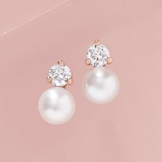 Made of solid 14k gold (not plated, not filled, not vermeil), these earrings are available in your choice of yellow, white, or rose gold (as well as platinum upon request) Adorned with genuine freshwater cultured pearls and sparkling diamonds together creating the perfect balance of sophistication and sparkle Available in three sizes, 0.12ctw, 0.20ctw, and 0.50ctw - scroll down for dimensions and further specifications Meticulously crafted, these earrings are elegant with an modern twist. Delivered in a beautiful gift box these earrings make the perfect for your nearest and dearest. Diamond & Pearl Stud Earrings Metal: 14K Solid Gold or Platinum Diamond Quality: G color, VS clarity Gemstone: White Freshwater Cultured Pearl Closure: Friction Back Sold as pair. Available Sizes: 0.12ctw Lengt Elegant 14k Rose Gold Round Earrings, Diamond Pearl Earrings, Pearl And Diamond Earrings, Earrings Metal, Freshwater Cultured Pearls, Pearl Stud Earrings, Rose Gold Diamonds, Pearl Size, Pearl Studs