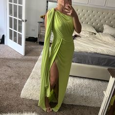 A Specialist In Statement Gowns, Michael Costello Has Dressed The Likes Of Beyonce, Cardi B, Kim Kardashian, And Lady Gaga. Never Worn, Brand New! 100% Poly Fully Lined Hidden Side Zipper Closure One Shoulder Styling Green Pre-draped Maxi Dress, Green One-shoulder Gown For Gala, One-shoulder Green Evening Gown, One Shoulder Green Evening Gown, Green Pre-draped Evening Gown, Green Draped Maxi Dress For Gala, Green Pre-draped Maxi Length Evening Dress, Pre-draped Green Maxi Evening Dress, Green One-shoulder Dresses With Sweep Train