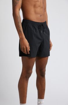 Quick-drying swim trunks feature a built-in liner and natural odor resistance, plus pockets that drain so your swims won't get bogged down. 5" inseam; 24" front rise; 11" front rise; 14" back rise (size Medium) Elastic/drawstring waist Side-seam pockets; back zip pocket Water-repellent Lined 88% recycled nylon, 12% spandex Machine wash, tumble dry Imported Functional Nylon Swim Trunks For Training, Functional Solid Swim Trunks With Built-in Shorts, Moisture-wicking 4-way Stretch Swim Trunks For Training, Training Swim Trunks With 4-way Stretch And Moisture-wicking, Black Short Swim Trunks For Water Sports, Black Short Swim Trunks For Swimwear, Lightweight Functional Swim Trunks For Outdoor, Functional Lightweight Swim Trunks For Outdoor, Functional Go-dry Swim Trunks For Training