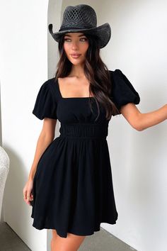 The Whitney Dress is the cutest summer pick you can't do without! Offering a flowy silhouette and double lined fabric that ensures the perfect fit. Make a statement with cut-out details at the back at your next day-time outing this summer! FABRICATION: SIZING: Crystal's height is 162cm and wears a size AU6/US2 Black Flowy Mini Dress For Summer, Black A-line Beach Dress, Flowy A-line Mini Sundress, Elegant Black A-line Sundress, Black A-line Flowy Mini Dress, Crop Outerwear, Green Swimwear, Summer Formal Dresses, Red Swimwear