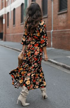 Bright, colorful flowers make a romantic statement against the inky background of this long-sleeve dress in a twirly wrap-inspired silhouette. Slips on over head Surplice V-neck Long sleeves Removable waist tie Lined 100% polyester Hand wash, dry flat Imported Fall Dress Trends, Petal And Pup, Europe Tour, Black Tie Wedding Guests, White Dress Shoes, Dark Autumn, Wrap Jacket, Usa Dresses, Floral Dresses Long