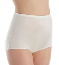 Silky smooth and ultra comfortable, this high rise panty has full coverage and a breathable, lightweight fit. Made with Satintrique nylon knit for a silky-soft feel Covered elastic waistband and leg openings for a custom fit. Semi-sheer silky knit body. High rise. Panties provide full rear coverage. Sewn-in cotton crotch for comfort. Colors match those in the Silhouette collection. Made in the same style as 11042 and 17042, best-selling Shadowline panties for 60+ years. Please Note: Model is wea Feminine Bottoms For Daywear, White High-waist Smoothing Shapewear, White High Waist Smoothing Shapewear, White Seamless 4-way Stretch Bottoms, High Waist Smoothing Beige Bottoms, Seamless White Bottoms With 4-way Stretch, Solid Full Coverage Nylon Shapewear, Elegant Nylon Bottoms With High-cut Leg, Elegant White Smoothing Shapewear