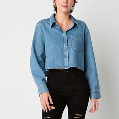 This Arizona women's and junior's denim button-down shirt brings a modern twist to a timeless piece. Made from a chambray cotton-blend for a regular-fit, it has a point collar, a chest slip pocket, and long cuffed sleeves. Wear it with distressed jeans and sneakers for a cool, laid-back look. Features: Accessory PocketClosure Type: ButtonFit: Regular FitNeckline: Collar NeckPockets: 1 Chest Slip PocketSleeve Length: Long SleeveSleeve Style: Cuffed SleeveApparel Length: 18.75 InchesFiber Content: Denim Blue Button-up Top, Denim Button-up Tops With Pockets, Fall Denim Button-up Tops, Trendy Medium Wash Button-up Top, Light Wash Relaxed Fit Top With Buttoned Pockets, Relaxed Fit Light Wash Tops With Buttoned Pockets, Fall Denim Tops With Snap Buttons, Light Wash Tops With Buttoned Pockets And Relaxed Fit, Denim Blue Button-up Top With Pockets