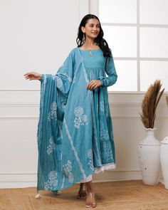 Beat the heat with effortless style in our Light Blue Hand Block Printed Anarkali Set. Made with the finest mul-mul fabric, this suit set is perfect for making a fashion statement even in soaring temperatures. Stay cool and chic even in heat. No. of pieces - 3 piece set. Color - Light Blue. Fabric - Mul-Mul. Washing Instructions - Dry Clean. Blue Cotton Silk Dupatta For Transitional Season, Transitional Blue Cotton Silk Dupatta, Blue Cotton Silk Kurta With Printed Motifs, Semi-stitched Indigo Kurta With Dupatta, Blue Chikankari Embroidery Cotton Silk Salwar Kameez, Blue Unstitched Palazzo Set For Transitional Season, Indigo Kurta With Dupatta For Eid, Blue Anarkali Salwar Kameez In Cotton Silk, Eid Indigo Kurta With Dupatta