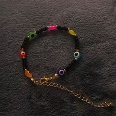 a bracelet with evil eyes on it