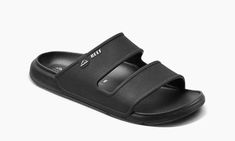 The Reef Men's Oasis Double Up Slide combines stylish design with features that make it a great sandal option for any water adventure. Featuring a water-friendly TPU material, textured footbed for additional traction and arch support for comfort, each slide has double straps for a secure and comfortable fit. Plus, the renewable sugarcane EVA material is not only durable, but also eco-friendly. Water-friendly, flexible TPU Arch support and heel cupping Renewable sugarcane EVA Instant-comfort double straps SUGAR CANE EVA CJ0366 Water Adventure, The Reef, Sugar Cane, Double Up, Black Slip Ons, Arch Support, Stylish Design, Slip On Sandal, Oasis