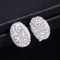 The perfect elegant statement earring for your next special event featuring bright light catching cubic zirconia crystals. material: cubic zirconia type: earring style: formal color: as shown gender: women Elegant Wedding Jewelry, Stone Stud Earrings, Romantic Jewelry, Romantic Jewellery, Alloy Earrings, Stone Studs, Rhinestone Earrings, Wedding Earrings, Silver Earrings Studs