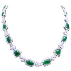 An exclusive design, so refined and glamour , a very piece of art, by Italian designer. Necklace come in 18k gold with 14 pieces of natural untreated Jades , excellent quality, of 18.68 carats, from Myanmar, in cabochon cut, in amazing green , and 991 pieces of natural diamonds of 7.66 carats, F color and VS clarity. It is a high jewels piece. Handcrafted by artisan goldsmith. Excellent manufacture and quality. Complete with AIG report. Length is about 18 inches, but it is resizable on request. Designer Necklace, Italian Designer, Drop Necklace, Myanmar, Italian Design, Exclusive Designs, Diamond Jewelry, Natural Diamonds, Jade