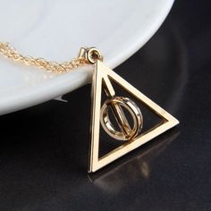 Price Firm Unless Bundled Nwt Gold-Tone Plated Brass Pendant Is Approximately 1.25" Long Chain Is Approximately 20" Pendant Spins For Fidgeting Harry Potter And The Deathly Hallows Smoke-Free Home, No Modeling Harry Potter Deathly Hallows Symbol, Deathly Hallows Necklace, Diamond By The Yard, Deathly Hallows Symbol, Fidget Necklace, Necklace Gold Jewelry, Harry Potter Deathly Hallows, Harry Potter Jewelry, The Deathly Hallows