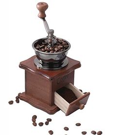 PRICES MAY VARY. Ⅰ, Retro style, wood seat, exquisite appearance, very suitable for a gift to your loved ones; homemade coffee lovers; coffee shop display of ground coffee beans. Ⅱ, Adjustable mode, turn the gear nut piece at the bottom, the more the gap is tightened, the thicker the ground coffee powder, the smaller the gap is, the smaller the coffee powder is. Ⅲ.The hand grinder is easy to operate, just set the required grinding gear, pour the coffee beans into the ceramic core, and the drawer Coffee Shop Display, Coffee Grinder Vintage, Magnet Making, Vintage Home Kitchen, Coffee Shop Bakery, Hand Cleaning, Ground Coffee Beans, Manual Coffee Grinder, Mocha Coffee