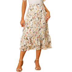 Featuring pretty ditsy floral prints, this midi skirt is a summer option that can be worn with just about anything. Channel elegant style in this midi skirt which is beautifully printed with a blossom pattern for a versatile look. It is made of lightweight fabric, adding definition to the free-flowing design. Falling to a waterfall midi hem, it sits high on the waist with a discreet side zip fastening. Summer days call for effortlessly feminine styles like skirts. Non-stretch Summer Midi Skirt, Spring Chiffon Flared Skirt, Spring Floral Print Flowy Skirt, Spring Knee-length Ruffled Skirt, Spring Tiered Skirt For Garden Party, Non-stretch Ruffled Skirt For Spring, Spring Midi Maxi Skirt For Garden Party, Knee-length Floral Print Skirt For Garden Party, Spring Floral Print Skirted Bottoms