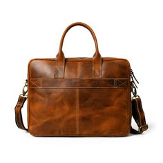 Elevate your professional presence with our Bison Elite Briefcase, meticulously crafted for a stylish edge. Fashioned from the finest full-grain buffalo leather, this masterpiece offers exceptional durability and a unique texture. Designed with capacious compartments and organizational elements, it seamlessly combines practicality with opulence. Its rich brown tone, complemented by striking orange accents, exudes undeniable sophistication, making it a perfect addition to any ensemble. Embrace th Timeless Brown Laptop Bag For Travel, Rectangular Leather Briefcase For Travel, Leather Travel Satchel Rectangular Shape, Classic Leather Laptop Case, Leather Travel Satchel Rectangular Case, Classic Brown Travel Bag, Classic Rectangular Bag With Luggage Sleeve, Timeless Brown Leather Bag, Leather Business Travel Bag