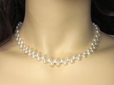 6 & 7 mm white half round genuine pearl necklace JNHRBA665 & JNHRBA775 PRODUCT INFORMATION: * Pearl Type: Genuine freshwater pearls with natural luster. * Pearl Color: White. * Clasp: Rhodium plated. * Pearl Shape and Size: Half Round freshwater pearls 6-6.5 & 7-7.5mm(approx.). * Pearl Luster: Good Luster. * Length: 16".  * Material: Genuine freshwater pearl. PROCESSING TIME & SHIPPING * Processing time: 1 to 3 business days. * Shipping cost is only applied for first item of the order. Shipping Pearl Necklace With Round Beads For Jewelry Making, Adjustable Classic Pearl Choker Necklace, Adjustable Beaded Pearl Necklace For Formal Occasions, Elegant Round Beads Pearl Necklace With Adjustable Fit, Elegant Adjustable Pearl Necklace With Round Beads, Formal Adjustable Pearl Necklace With Pendant, Classic Handmade Pearl Jewelry, Handmade Classic Pearl Jewelry, Elegant Pearl Jewelry With 8mm Beads