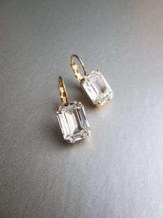 Crystal Bridal Earrings Emerald Drop Earrings Rhinestone - Etsy Gold Baguette Cut Earrings For Wedding, Classic Crystal Earrings For Party, Classic Bridal Earrings With Diamond Cut For Party, Classic Crystal Earrings With Prong Setting For Party, Classic Sparkling Crystal Earrings For Formal Occasions, Classic Emerald Cut Earrings For Wedding, Classic Emerald Cut Wedding Earrings, Elegant Emerald Cut Earrings For Wedding, Elegant Emerald Cut Wedding Earrings