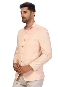 Product Features: Top Color: Light Peach Work: Solid Top Fabric: Suiting Fabric Pack Of: 1 Jodhpuri Occasion: Partywear Disclaimer: There will be slight difference in digital to actual image Fitted Pink Bandhgala For Diwali, Pink Fitted Bandhgala For Diwali, Pink Partially Stitched Unstitched Suit For Formal Occasions, Pink Formal Kurta For Diwali, Formal Pink Nehru Jacket With Zari Work, Formal Pink Kurta For Festivals, Pink Unstitched Suit For Eid Formal Occasion, Pink Formal Unstitched Suit For Eid, Pink Formal Kurta For Festivals