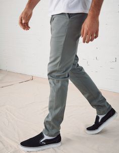 RSQ Skinny Chinos. Formerly known as the "Seattle Skinny Taper Chino Pants". Slant front pockets with welt back pockets and additional decorative pocket with RSQ tag at back left pocket. Approx leg opening: 13.5"(34cm). 97% cotton/3% spandex. Machine wash. Imported.Model is 6'2.5" wearing a size 31x32.Approx outseam: 41"Approx leg opening: 13.5" Casual Fitted Straight Work Pants, Fitted Bottoms For Business Casual, Fitted Casual Work Pants, Relaxed Fit Flat Front Pants For Fall, Casual Pants With Button Zip Fly, Casual Full-length Pants With Button Zip Fly, Casual Dress Pants With Button Closure For Business Casual, Casual Pants With Button Zip Fly For Everyday, Casual Fitted Pants With Buttons