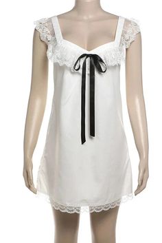 Embrace effortless charm with our Lace V-Neck Backless Bows Suspender Mini Dress. Featuring a flattering V-neckline and delicate spaghetti straps, this dress exudes a blend of elegance and allure. Details: Elasticity: Slight Stretch Fabric Type: POLYESTER Silhouette: STRAIGHT Neckline: V-Neck Material: POLYESTER Material: SPANDEX Size (IN) Bust Length S 34.65 33.07 M 36.22 33.86 L 37.80 34.65 White V-neck Slip Dress With Delicate Straps, White V-neck Slip Dress With Adjustable Straps, Feminine V-neck Mini Dress With Delicate Straps, V-neck Mini Dress For Wedding Night In Spring, White Slip Dress With Straps For Night Out, White Lace Trim Slip Dress For Date Night, White Slip Dress With Lace Trim For Date Night, White Slip Dress With Sweetheart Neckline For Night Out, White V-neck Slip Dress For Night Out