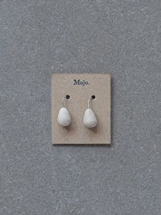 These earrings are lightweight and very versatile, perfect to wear casually or when you're wanting to feel a little more special. Each pair is individually handcrafted and hand finished, with a focus upon slow traditional processes - making hand-built stoneware ceramics and then hand forming silver wires through bending and hammering stages. Details: Colour: Natural unglazed stoneware clay Handcrafted from 100% stirling silver wires, and hand formed and fired drop shaped stoneware pottery beads. Minimalist Jewelry In Natural Tones As A Gift, Handmade Natural Jewelry For Everyday, Everyday Adjustable Teardrop Earrings, Modern Handmade Earrings For Everyday, Modern Handmade Everyday Earrings, Modern Everyday Handmade Earrings, Artisan Teardrop Single Earring, Artisan Single Teardrop Earring, Handmade Drop Wrap Earrings For Everyday