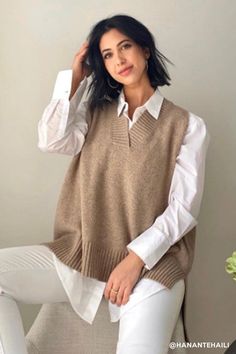 Lyla Oversized Knit Vest Enjoy newtro vibes! Featuring a super cozy wool blended knit material all over, a ribbed V-neck, an oversized fit, an asymmetric hem length silhouette, and pull on style * Product Specification Wool 55% Polyester 23% Nylon 22% * Flat Measurement: S/M: Shoulder: 32??(12.6in) / Bust: 65??(25.6in) / Length: 79??(31.1in) * Professional Clean OnlyModel's height is 5'7" (176cm) Bust 32in Waist 24in Hip 35in and wearing S/M Brown Layering Sweater Vest, Oversized Knitted Sweater For Work, Trendy Oversized Sweater Vest For Fall, Everyday Knit Sweater Vest For Fall, Relaxed Fit Sweater Vest For Fall Layering, Everyday Fall Knit Sweater Vest, Fall Knit Sweater Vest For Everyday Wear, Trendy Winter Sweater Vest For Layering, Trendy Sweater Vest For Winter Layering