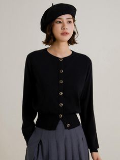 This is a feminine and romantic cardigan by LANGSON that is made out of high quality acrylic, polyester, nylon, and wool blend fabric. With design detail of minimal round neckline and high quality buttons on the front, it gives a trendy and feminine look.- Thick ribbed hem for feminine silhouette- Front button closure- Feminine and modern mood Elegant Fine Knit Outerwear In Solid Color, Elegant Button-up Fall Sweater, Elegant Button-up Winter Sweater, Elegant Button-up Sweater For Layering, Elegant Button-up Sweater, Elegant Winter Sweater With Button Closure, Elegant Solid Color Button-up Sweater, Elegant Cardigan With Buttons, Elegant Long Sleeve Cardigan With Buttons