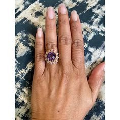 Amethyst, Pink Sapphire, and Diamond Cocktail Ring!  Playful yet Powerful! Its like having a piece of glittery candy on your finger! This ring has a Checkers Round Cut Amethyst that weighs 4.90 Carats and is embellished with alternating 12 Pink Sapphires that weigh 0.28 Carats and 12 Round Cut Diamonds that weigh 0.20 Carats. (Clarity: SI2, Color:F) The total carat weight of the ring is 5.38 Carats.  The ring is crafted in 14 Karat Yellow Gold and weighs approximately 4.8 grams. The ring is a si Purple Diamond Gemstones With Accent Stones, Fine Jewelry Amethyst Ring With Accent Stones, Fine Jewelry Purple Cluster Rings, Dazzling Amethyst Ring As A Gift, Dazzling Amethyst Ring Gift, Dazzling Amethyst Gift Ring, Cluster Amethyst Gemstone Rings, Amethyst Cluster Rings With Gemstone, Amethyst Cluster Gemstone Rings