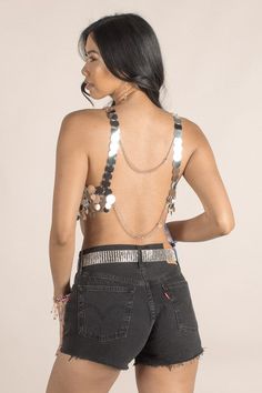 Add some sparkle to your style with the Kacey Glimmer Top! This gold sequin crop top will make you shine at any festival (or just a night out). With two adjustable straps, this one-size-fits-most top is perfect for any party-goer looking to stand out. Sequin Halter Top For Summer Party, Summer Party Sequined Halter Top, Metallic Sequined Party Crop Top, Metallic Sequin Crop Top For Party, Glamorous Sequined Crop Top, Glamorous Sequined Crop Top For Night Out, Glamorous Metallic Halter Top For Night Out, Summer Sequined Backless Halter Top, Sequined Backless Halter Top For Summer