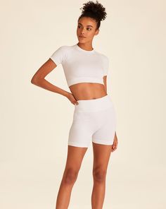 A soon-to-be staple in both your workout ensemble and everyday wardrobe. Our incredibly versatile Barre Seamless Tee is made to move with you. This style runs small. Please consider sizing up. Fitted White Activewear With Built-in Shorts, Summer Compression Seamless Activewear, Summer Seamless Compressive Activewear, Summer Seamless Compression Activewear, Fitted Short Sportswear Tops, Seamless Summer Activewear For Pilates, Fitted Short Length Sportswear Tops, Fitted Short-length Sportswear Tops, Fitted Short-length Sports Top