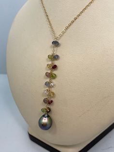 "This is a custom designed drop necklace crafted from 14kt yellow gold. It features a 10mm teardrop silver pearl and 15 natural gemstone faceted beads. It is a 'Y' motif necklace. The chain is 16\" with 2.25in long drop. It weighs 2.5dwt. If you love this necklace, please see the matching earrings in my other listing." Ametrine Ring, Gold Rosary, Vintage Omega, Black Hills Gold, Y Necklace, Necklace Craft, Drop Necklace, Multi Stone, Silver Pearls