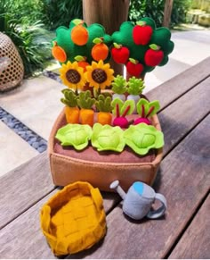 a potted plant sitting on top of a wooden table