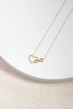 Love can be found even in the smallest details. This infinity heart necklace may seem like a small detail, but it definitely carries the biggest meaning. It is the most elegant representative of immortal love. DETAIL * Made to order. * 100% 14K Solid Gold * Gold Color Selection: Yellow Gold, Rose Gold, White Gold * Cubic zirconia * Pendant Lamp Height: 21 mm / 0.82 inch * Pendant Width: 12 mm / 0.47 inch * Length: 14", 16", 18", 20", 22" (I have a little note in the photos that may help you.) * Ready to Ship in 1-3 Business Days * 100% sourced from the USA * Free returns within 14 days from order date A B O U T ∙ U S * All customization is done by hand. Because it's better this way. * 100% Ethically Sourced, USA raw materials * Our beautiful packaging was created with love and fun on a mot Elegant Heart-shaped Cable Chain Jewelry, Elegant Cable Chain Necklace For Mother's Day, Elegant Sterling Silver Heart Necklace With Cable Chain, Gold Infinity Necklace Fine Jewelry, Elegant Cable Chain Jewelry For Valentine's Day, Yellow Gold Infinity Necklace Fine Jewelry, Dainty Heart Necklace With Cable Chain For Anniversary, Dainty Infinity Necklace As Gift For Her, Infinity Yellow Gold Jewelry Gift For Her