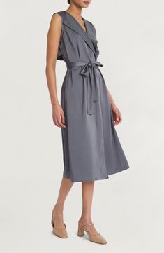 Satin accents lend casual elegance to a modern take on the classic shirtdress silhouette. 47" length (size Medium) True wrap style Surplice V-neck; shawl collar Sleeveless Unlined 100% polyester Machine wash, dry flat Imported Classic V-neck Shirt Dress For Work, Classic V-neck Midi Dress For Summer, Chic Spring Shirt Dress For Daywear, Chic Belted Shirt Dress, Summer Sleeveless Dress For Office, Knee-length Wrap Dress For Day Out, Chic Sleeveless V-neck Dress For Work, Chic Solid Color A-line Shirt Dress, Summer Midi Dress With Surplice Neckline For Daywear