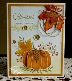 a handmade card with an autumn scene and the words, bersaed beyond measure