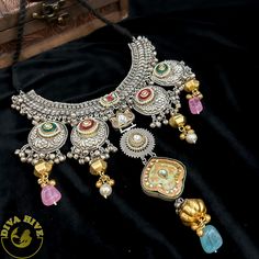 Our special Necklace is curated on brass crafted Pachi Kundan and quartz Polki with Real Stones and High quality BeadsThis is a absolutely gorgeous and trending Piece.Metal: Brass with 92.5 SilverPolish: Silver Nickel FreePerfect for all occasion(Party, Wedding ,Engagement)Note: This product is handcrafted and vintage, it has slight irregularities in design which only add to its beauty. Due to the differences in displays of computers/laptops/phones or may be photographic lighting sources the col Engagement Notes, Special Necklace, Real Stone, Classic Jewelry, Photographic Lighting, Laptop Computers, Silver Jewellery, Jewelry Care, Party Wedding